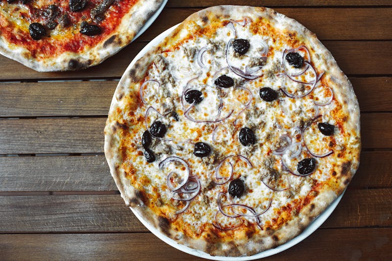 BBQ Chicken Pizza with smoky sauce and red onions